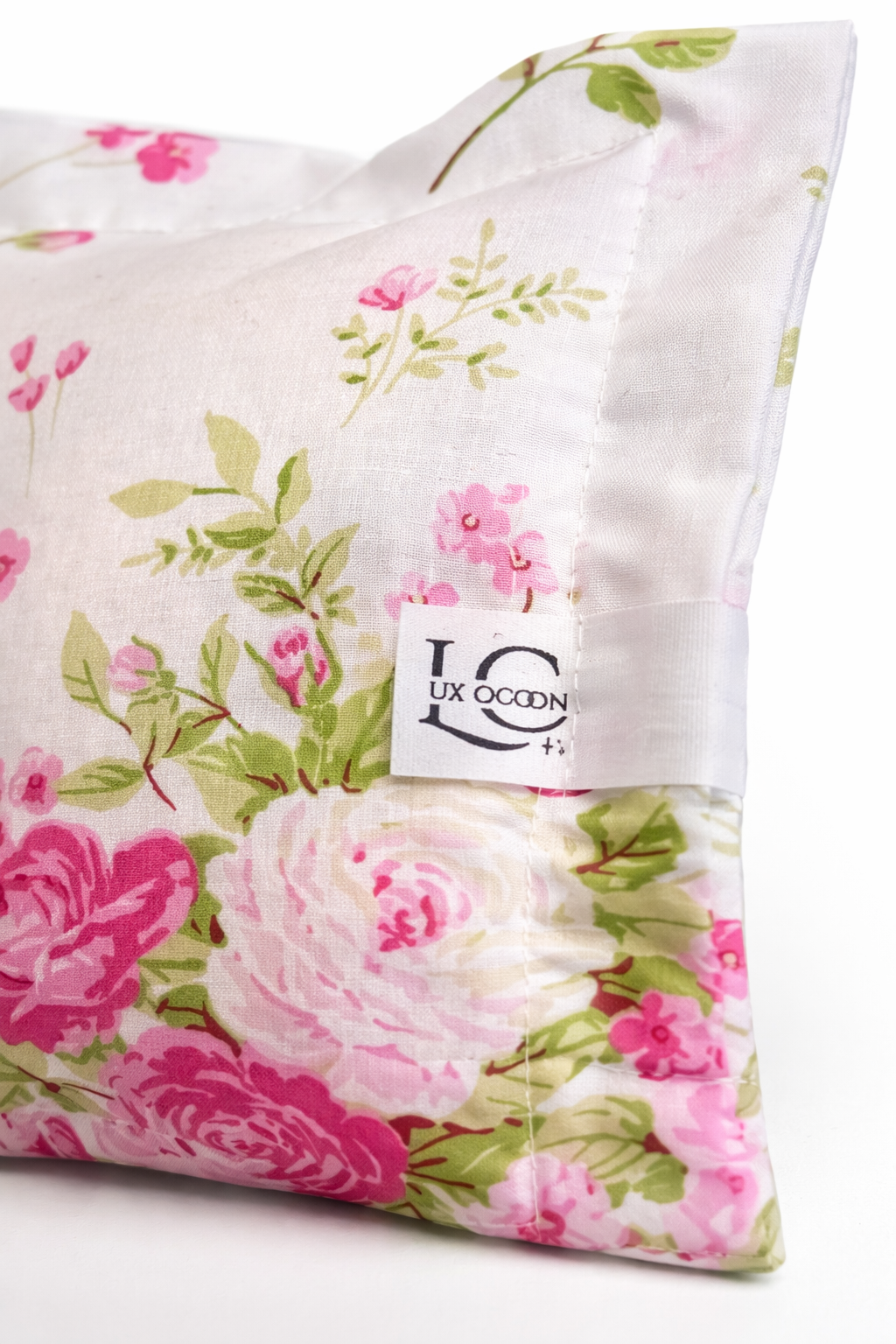 Detailaufnahme des Zirbenkissen in der Farbe Rosa & Grün