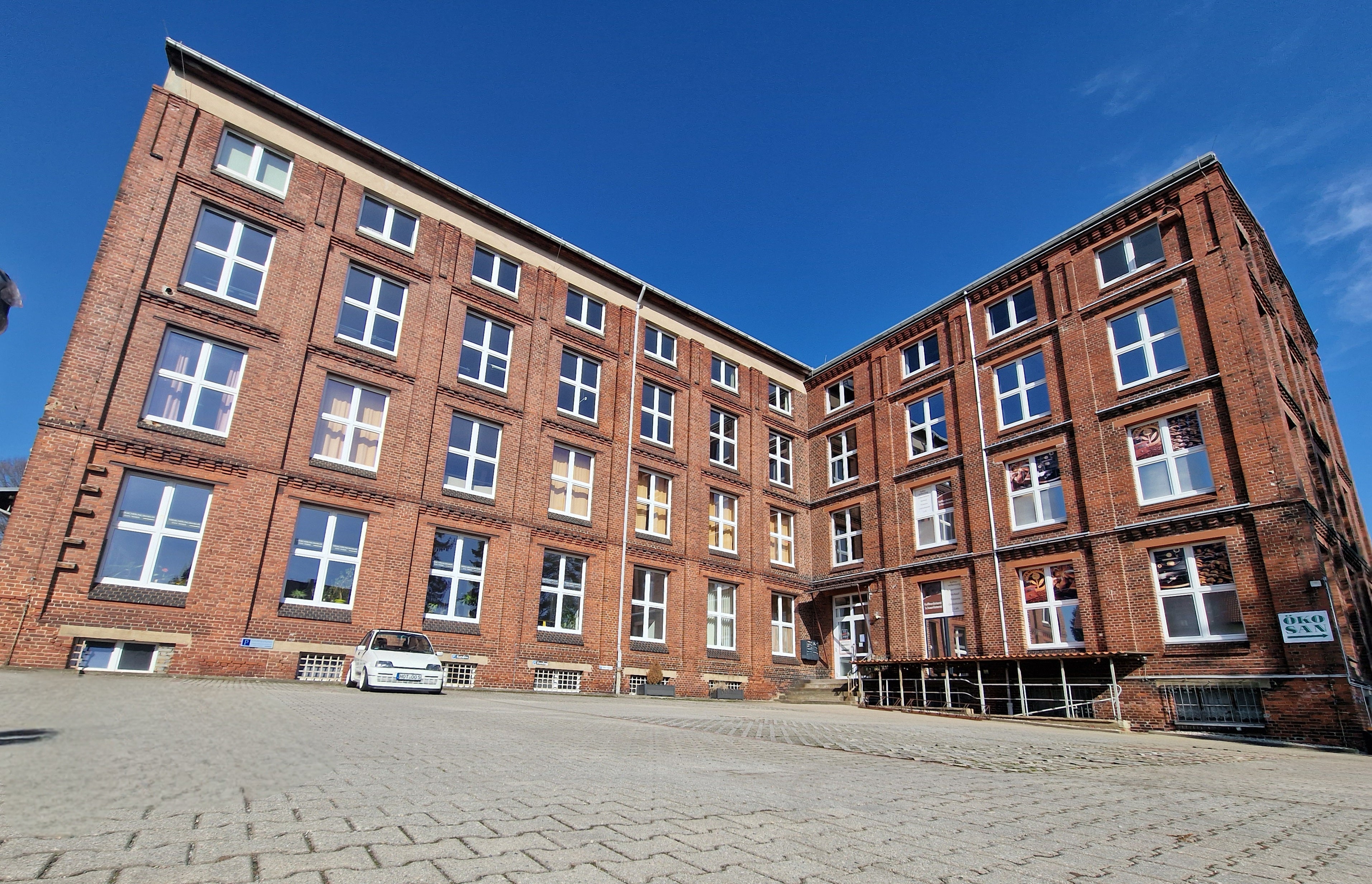 Backsteingebäude am Standort von LuxCocoon – zukünftiger Showroom in Planung